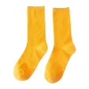 Calcetines deportivos de mezcla de algodón y amoniaco amarillo unisex medio cartucho absorbente de humedad y transpiración Item Picture